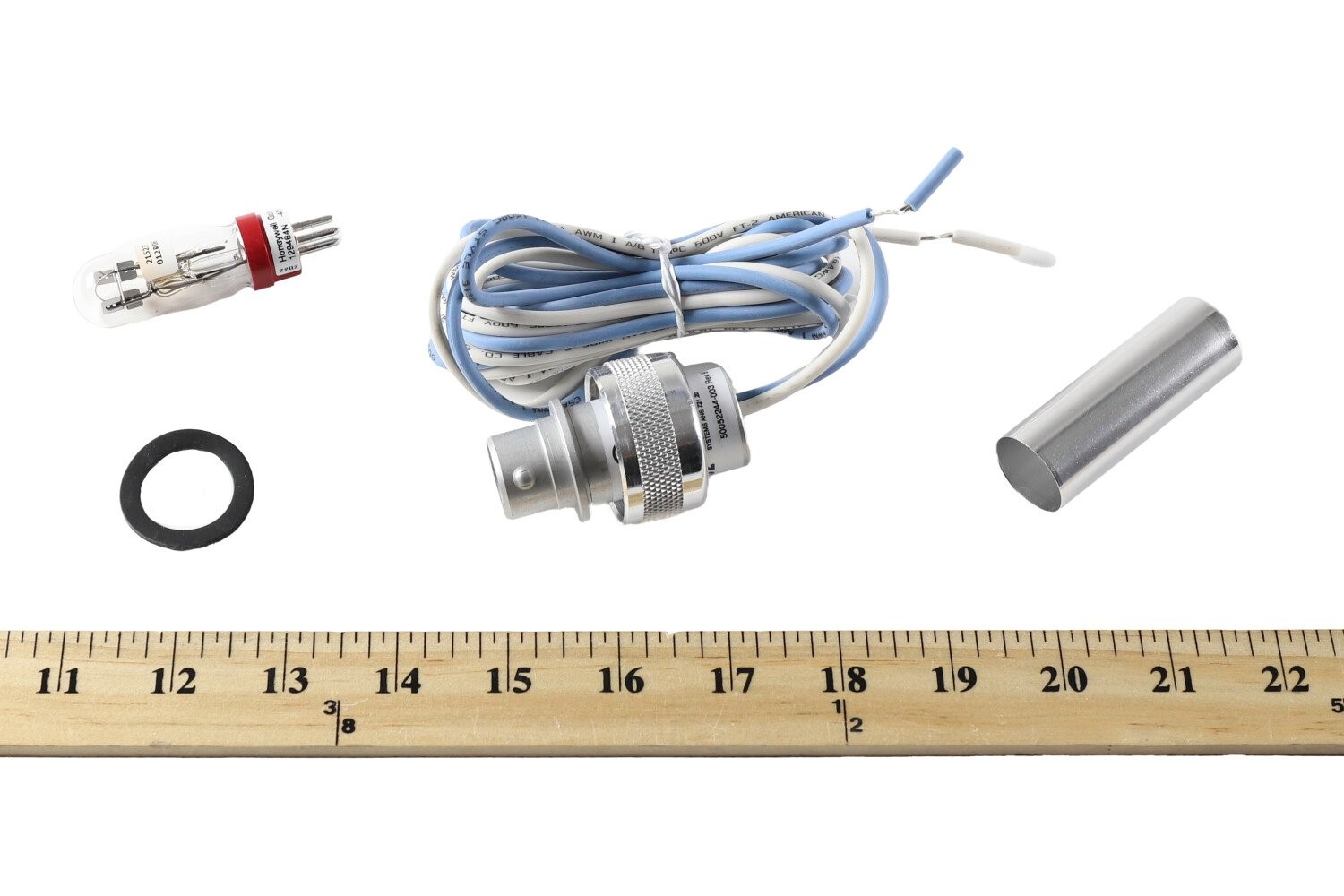 Honeywell C7035A1031 Minipeeper sensor with ruler for size reference