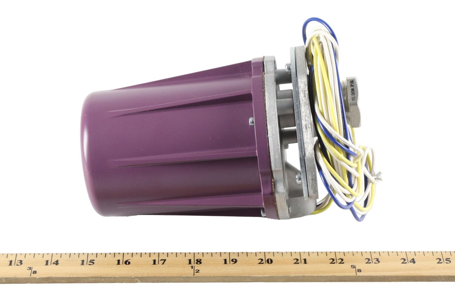 Honeywell C7061A1053 ultraviolet flame detector with purple housing, color-coded wires, and scale measurement for burner control systems