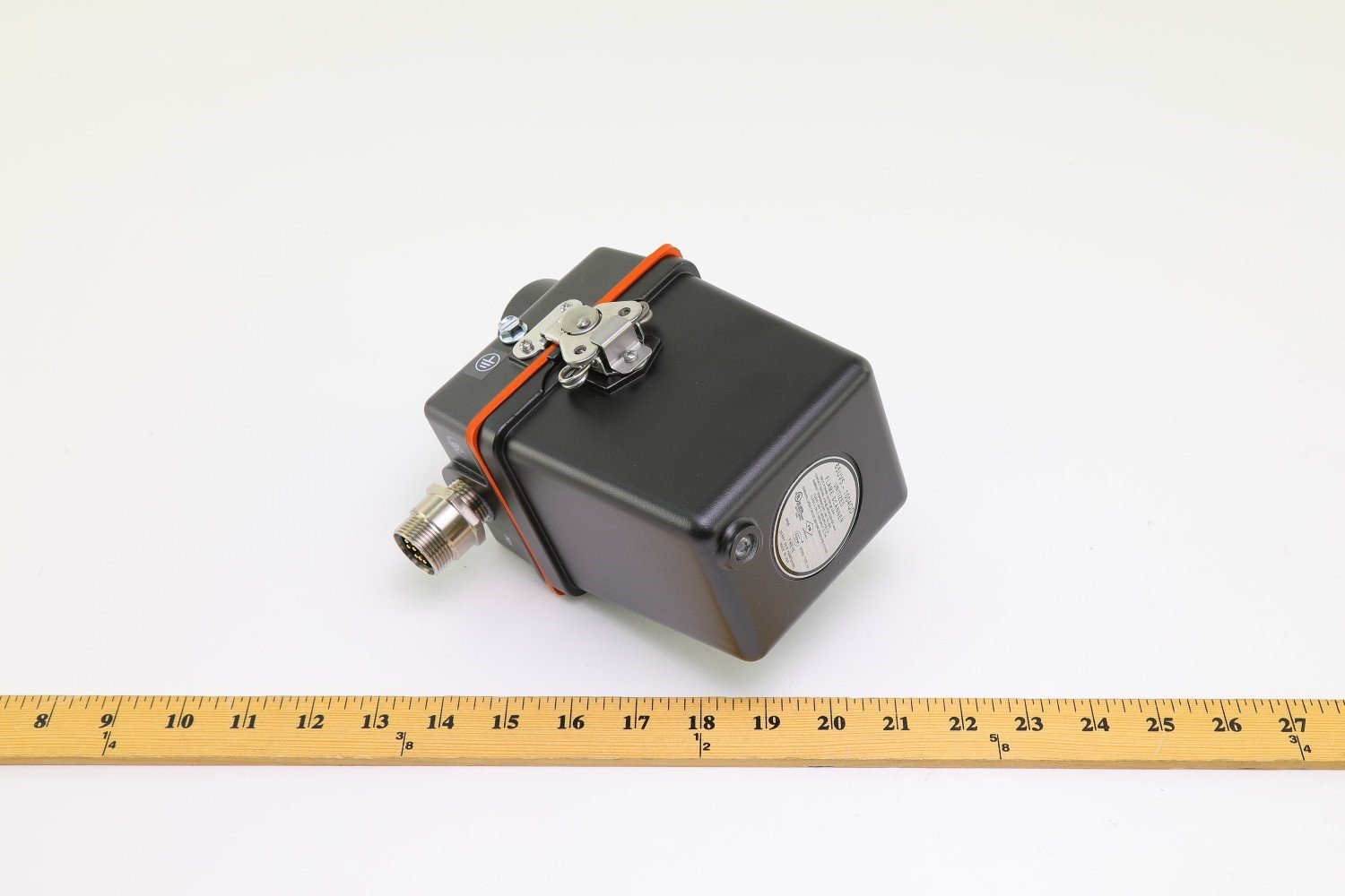 Fireye 65UV5-1004QD flame scanner with ruler for scale