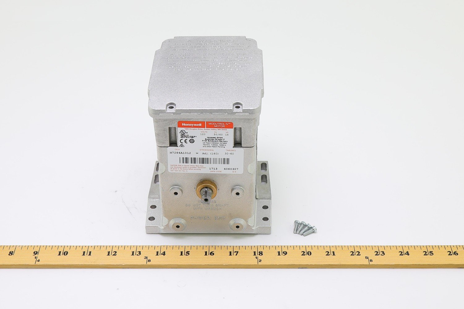Honeywell M7284A1012 actuator with ruler for size reference